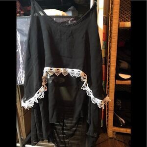 Black flutter multi layer sheer top with white embroidery trim.